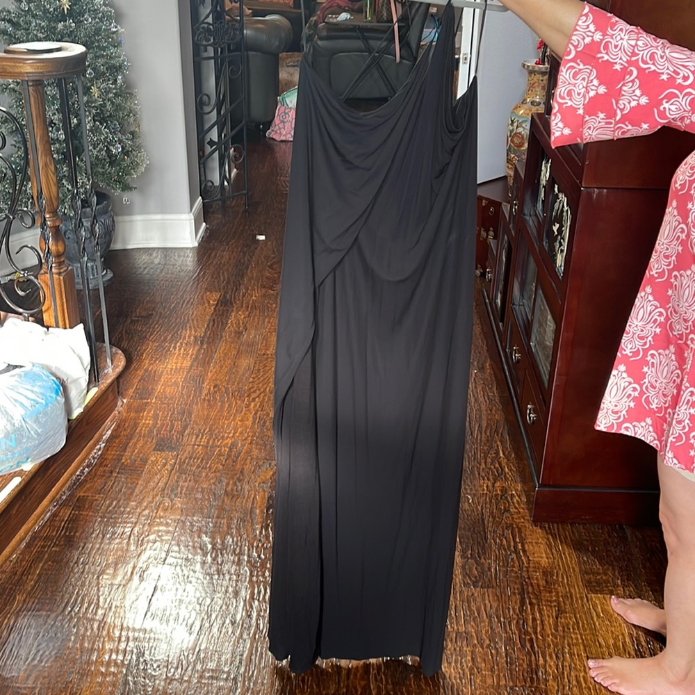 Beautiful black summer chic dress. Semi wrap dress with split